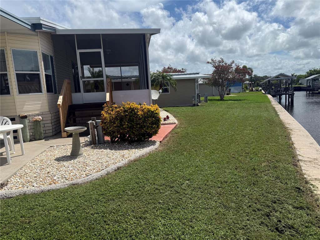 Photo of 138 S Saint Thomas Circle, Apollo Beach, FL 33572 (MLS # TB8537078)