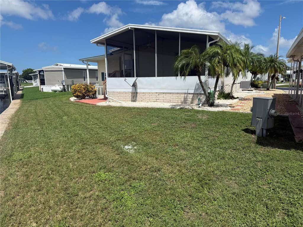 Photo of 138 S Saint Thomas Circle, Apollo Beach, FL 33572 (MLS # TB8537078)