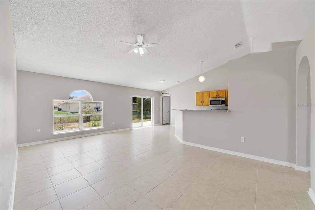 Photo of 529 Peace Drive, Poinciana, FL 34759 (MLS # O6435616)