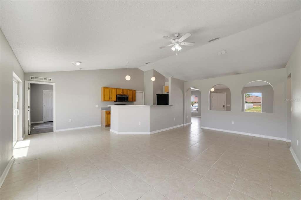 Photo of 529 Peace Drive, Poinciana, FL 34759 (MLS # O6435616)