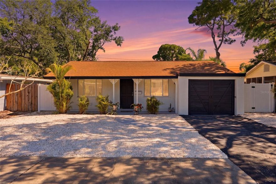Now offered BELOW recently appraised value, this fully renovated 2 Bedroom / 1 Bathroom pool home is an incredible opportunity in today’s market! Welcome to 8020 24th Ave N— located in the highly sought-after Jungle Terrace neighborhood. Situated in a NON-FLOOD zone, this property offers peace of mind along with true move-in-ready living. Step inside and you’re greeted by a bright, open living space that seamlessly flows into the kitchen and dining area. The fully renovated kitchen features new, spotless Carrera Quartz countertops, a matching backsplash, new cabinetry, stainless steel appliances, recessed lighting and a convenient breakfast bar. A partial garage conversion expands the main living area, while still offering a 6x10 dry storage space with built-in cabinetry for added functionality. This home has been thoughtfully upgraded with a BRAND NEW HVAC recently installed, freshly painted interior, brand new luxury vinyl flooring throughout, added built-in living room storage, new light fixtures and ceiling fans, new interior doors, and new window blinds. Fully renovated bathroom with a glass-enclosed shower, stylish new vanity, and a smart mirror that adds a modern, spa-inspired touch. New sliding glass doors lead you out to your own private tropical retreat complete with a large resurfaced in-ground pool, stylish paver patio, and a custom shade sail creates a comfortable, shaded lounge area—perfect for relaxing poolside or escaping the afternoon sun. Fully fenced backyard designed for relaxing and entertaining year-round! The exterior has been equally enhanced with fresh paint, new wood siding on the front and back, a resurfaced driveway, new pool pump and equipment, lush tropical landscaping, and new fencing and gates for added privacy and curb appeal. Enjoy a prime central location just 5 minutes to Tyrone Square Mall, 10 minutes to Treasure Island Beach, and 20 minutes to Downtown St. Pete—putting the best of shopping, dining, and coastal living right at your fingertips. Don’t miss your opportunity to own this turnkey St. Pete gem!