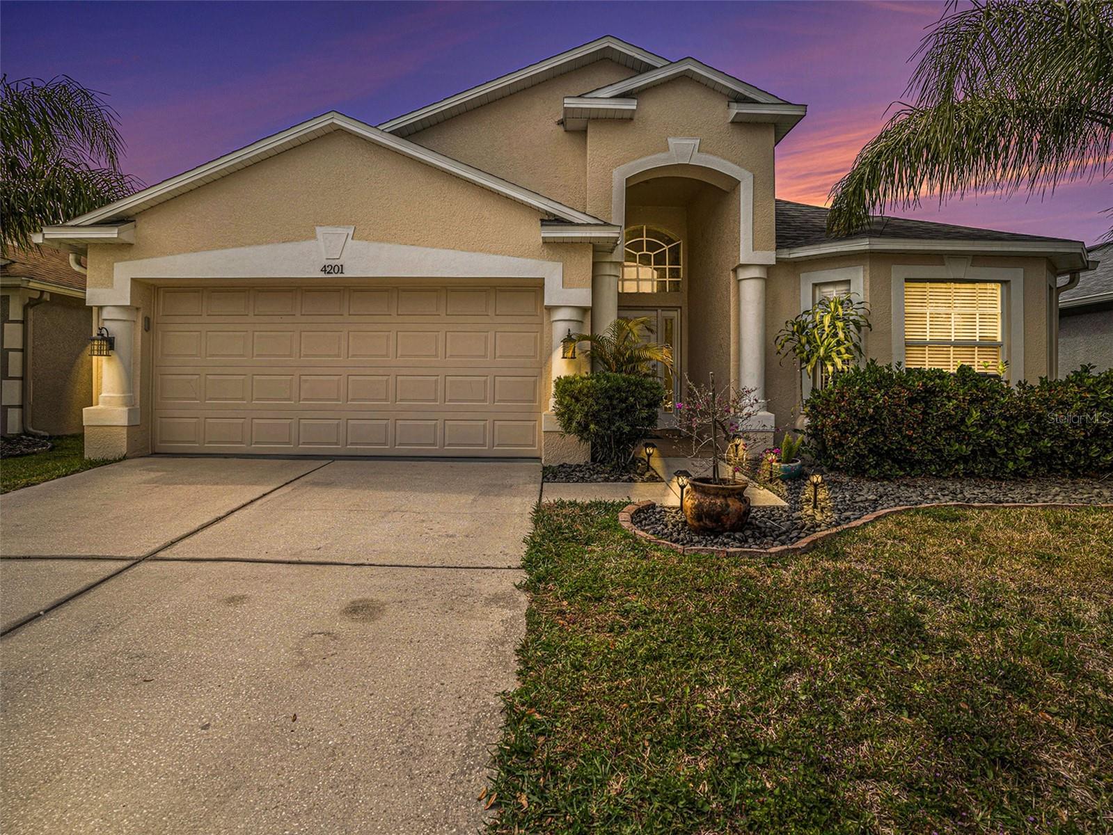 4 BEDROOM/ 3 FULL BATH home located in the exclusive gated neighborhood of Whinsenton Place in Wesley Chapel’s Meadow Pointe Community! Perfect for a new start in Wesley Chapel, for your first home or growing family! Well maintained with a NEW ROOF (6/2023) and Upgraded NEW Floors, New Carpet and NEW PAINT! You can enjoy neighborhood living in this beautiful home with your oversized TOTALLY FENCED back yard for entertaining or your future pool. This updated home is move-in ready, with a new roof (2023), new porcelain tile in main living areas and new carpet in bedrooms with Brand New Paint throughout the whole home! The master suite features an en suite with his and hers vanities, soaking tub with separate shower and HUGE walk in closet! Two bedrooms share a Jack and Jill bath and the 4th bedroom has an adjacent full bath. The community of Meadow Pointe offers residents a wide variety of amenities including community pools, playgrounds, tennis and basketball courts. Located in one of the best locations; highly desired schools, close to Wiregrass Mall, Tampa Premium Outlets, The Grove, and the new KRATE Micro Shops open-air shopping and entertainment zone, extremely close to I-75, I-275, hospitals, USF, and so much more! New restaurants surround this location- LIKE THE NEW COOPERS HAWK RESTAURANT AND WINERY! This area of Meadow Pointe offers LOW HOA FEES, only $102/year! Don't miss your chance to own this stunning home and experience the best that Meadow Pointe has to offer with this meticulously kept home, in a great location, with the new developments all around Wesley Chapel- enjoy your private gated community while still being near all the new attractions and entertainment. Schedule your showing today. Sellers are motivated!