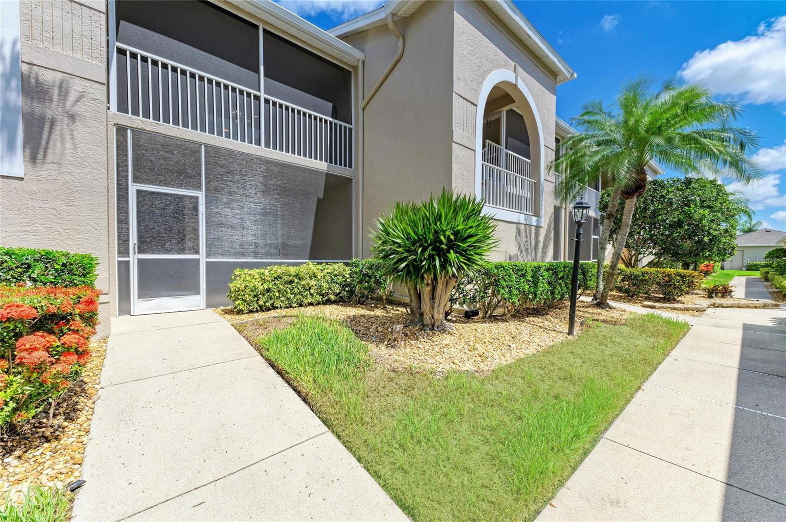 Live the Dream in Stoneybrook Golf and Country Club on Palmer Ranch. Enjoy incredible fairway and green views of the newly redesigned 17th hole from your private, screened-in back lanai. This second-floor Carlton model condo features vaulted ceilings throughout the living room, dining room, and kitchen—creating a bright, airy space perfect for everyday living and entertaining.
The kitchen includes stainless steel appliances, a breakfast nook, and access to the front screened lanai, ideal for enjoying peaceful mornings. The unit comes furnished and new carpet in living areas. The primary bedroom suite offers twin walk-in closets, a great bay window for a dressing table or additional sitting, and a slider out to the lanai. An en-suite bath with a walk-in shower. The split-bedroom layout provides privacy with a spacious second bedroom and adjacent full bathroom. In-unit laundry room with washer, dryer, and more storage. Detached one-car garage. Designer lighting from Venice Lighting Co. The 2024 Golf Course Modernization assessment has been PAID IN FULL by the seller making this a rare opportunity to enjoy a modernized golf experience with no additional expense. Residents enjoy an updated clubhouse and restaurant, 18-hole Arthur Hills–original designed golf course, Har-Tru tennis courts, a state-of-the-art fitness center, resort-style pool and spa, direct access to the Legacy Trail for biking and walking. Stoneybrook Golf and Country Club is a premier member-owned country club community, ideally located between Downtown Sarasota and Downtown Venice, just minutes from Siesta Key Beach.
This is the lifestyle you've been waiting for—schedule your private showing today!
