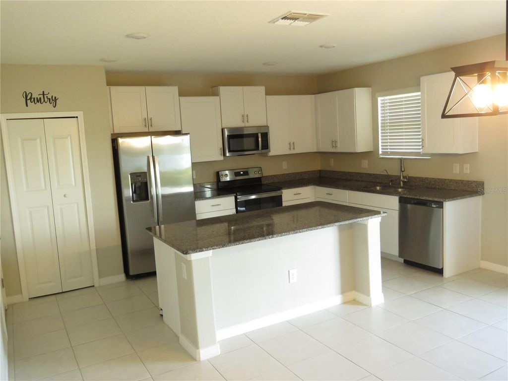 Photo of 15518 Miller Creek Drive, Sun City Center, FL 33573 (MLS # TB8456030)