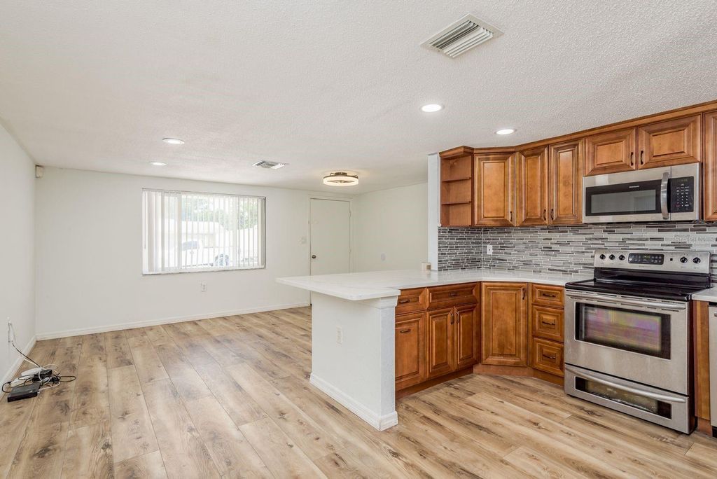 Photo of 9826 Rainbow Lane, Port Richey, FL 34668 (MLS # TB8434862)
