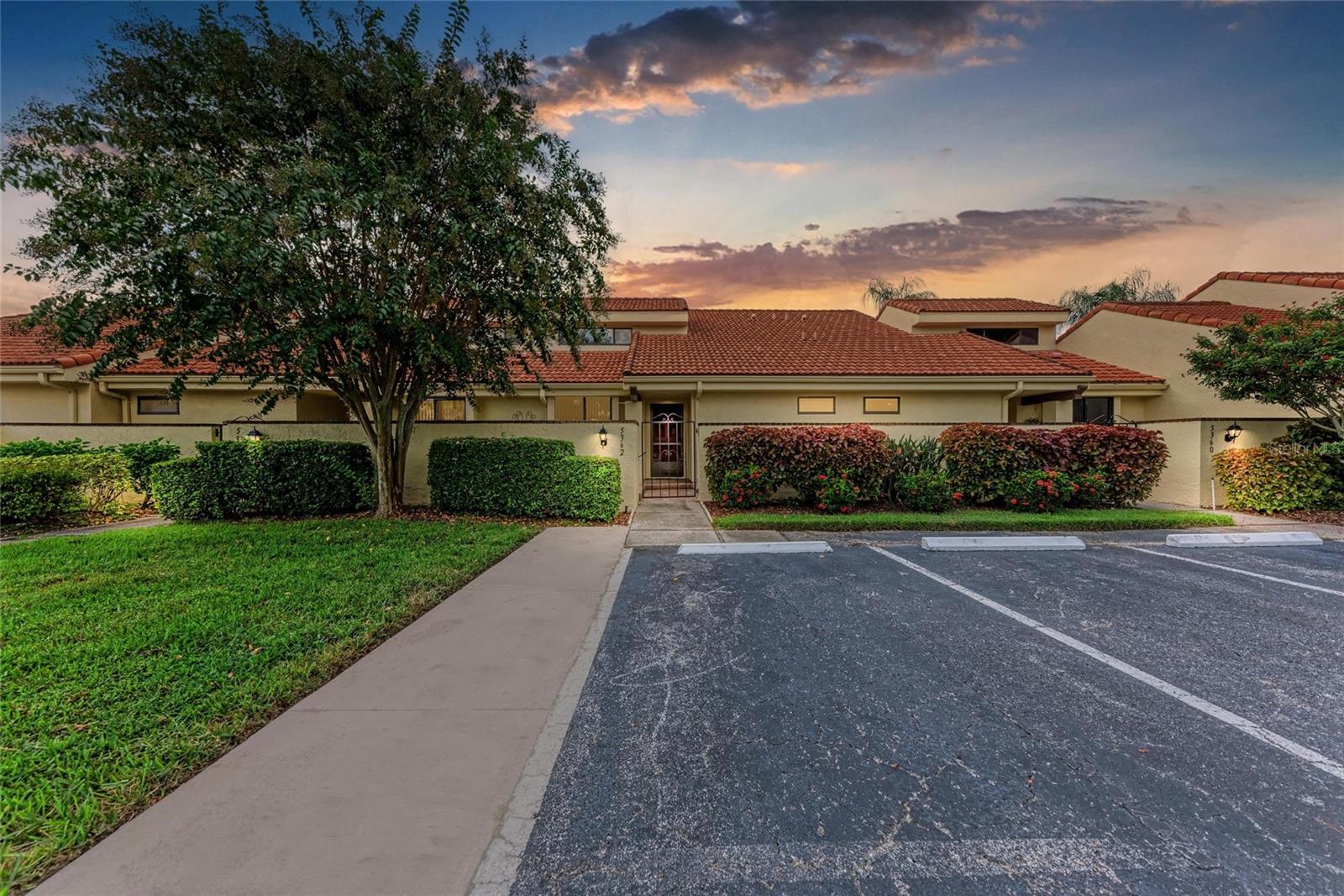 Discover the Best of Sarasota Living at Huntingwood in The Meadows. Welcome to Huntingwood at The Meadows—where comfort, convenience, and resort-style living blend seamlessly. Nestled in one of Sarasota’s most desirable communities, this spacious three-bedroom townhome offers the feel of a single-family home with the ease of maintenance-free living. The smart, two-story layout places the primary suite on the main level, featuring dual vanities, a walk-in shower, and generous closet space. Upstairs, two large guest bedrooms and a full bath provide ample room for family or visitors. The light-filled kitchen is thoughtfully designed with a built-in buffet and sliding doors that open to a private front patio—ideal for morning coffee or alfresco dining. An open-concept living and dining area flows effortlessly, with walls of glass showcasing tranquil garden and pool views. Step out to the screened and covered lanai—your private retreat—also accessible from the primary suite. Additional features include covered parking with attached storage, making everyday living both practical and stress-free. Residents of The Meadows enjoy a truly exceptional lifestyle: heated pools, a recently renovated fitness and wellness center, 14 miles of scenic walking and biking trails, and optional golf and tennis memberships. All this in an unbeatable location—just minutes from UTC, Nathan Benderson Park, I-75, downtown Sarasota, and the white-sand beaches of the Gulf Coast. This is more than a home—it’s the Sarasota lifestyle at its finest.
