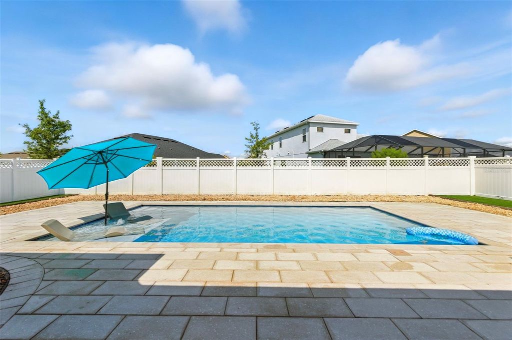 Photo of 7063 Talamore Drive, Wesley Chapel, FL 33545 (MLS # TB8419641)
