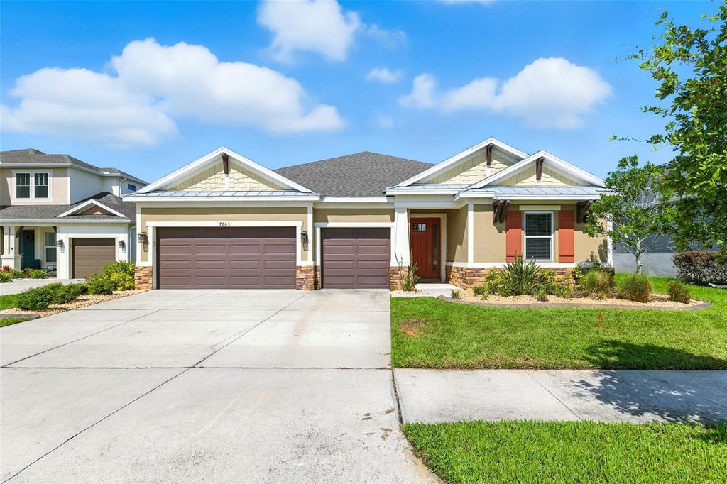 Photo of 7063 Talamore Drive, Wesley Chapel, FL 33545 (MLS # TB8419641)