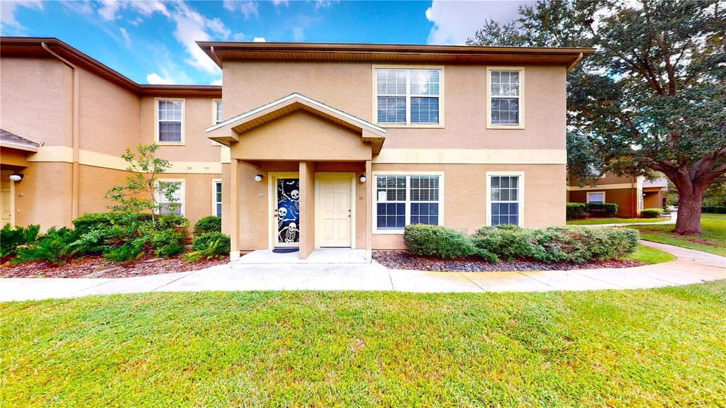 Photo of 36100 Lake Chase Boulevard #104, Zephyrhills, FL 33541 (MLS # TB8554889)