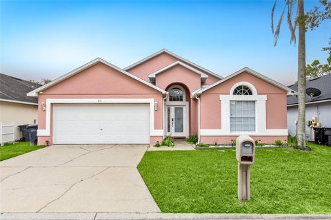Photo of 611 Saddle Ridge Drive, Davenport, FL 33896 (MLS # O6437459)