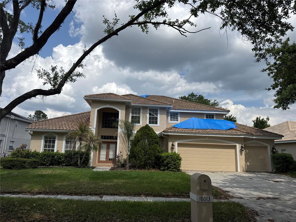 Photo of 18013 Forest Retreat Lane, Tampa, FL 33647 (MLS # O6405650)