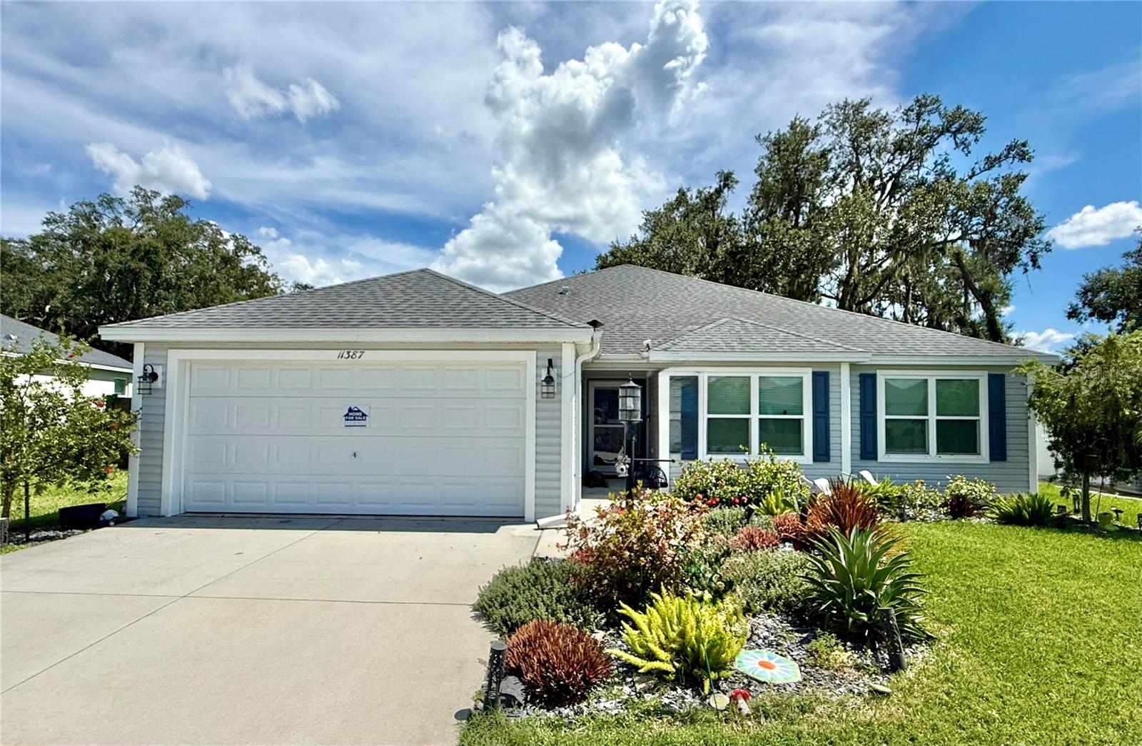 This charming residence at 11387 Zimmerman Path features a spacious layout with four bedrooms and two bathrooms. The open-concept living area boasts abundant natural light, seamlessly connecting to a modern kitchen equipped with all updated stainless steel appliances and ample cabinetry. All light fixtures and fans have been updated. The lanai, previously just screened in, has had hurricane rated windows added, giving not only extra protection during FL storms, but is also a great retreat when the weather cools down. The property has a well-manicured yard with all new landscaping. The fully fenced in extended backyard, offers a peaceful escape, as there are no backyard neighbors. There's been a patio added, perfect for outdoor enjoyment and entertaining. The back yard is also set up with an auto-mower, making yard maintenance a breeze. A two-car garage provides additional storage and parking options, as well as an EV charger. The home has also had solar panels added, making a nice cut in the electric bill! Situated in Oxford Oaks, a welcoming neighborhood, with a community pool, playground, as well as basketball, tennis, and pickleball courts. Conveniently located less than 5 minutes to shopping, restaurants, banks, the post office, and so much more. There is no Bond on this property.