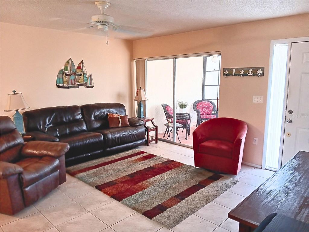 Photo of 8150 Braddock Circle #3, Port Richey, FL 34668 (MLS # W7885743)