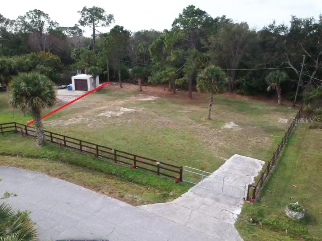Photo of 167 West Loop, Oak Hill, FL 32759 (MLS # NS1087022)