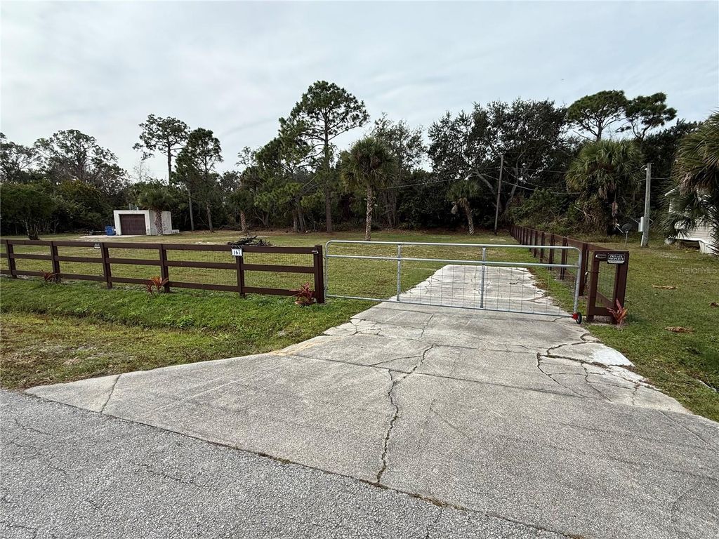 Photo of 167 West Loop, Oak Hill, FL 32759 (MLS # NS1087022)