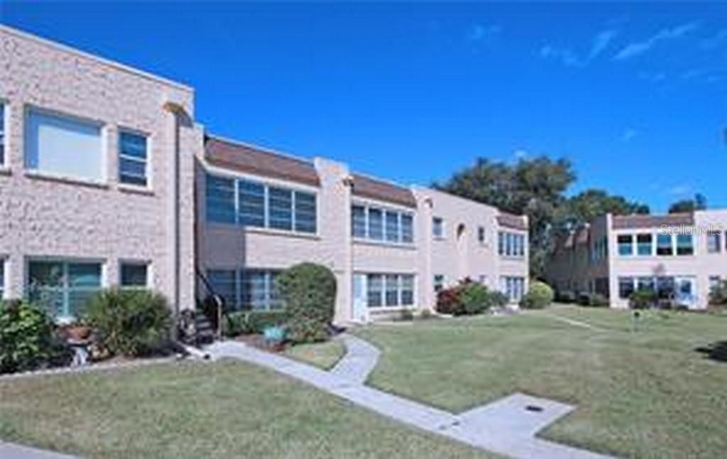 Photo of 221 Cedarwood Circle #221, Seminole, FL 33777 (MLS # TB8416095)