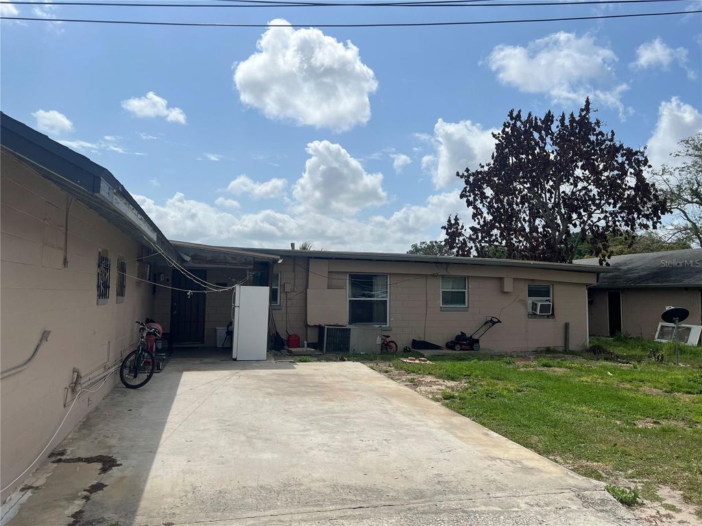 Photo of 617 E Myers Boulevard, Mascotte, FL 34753 (MLS # O6395319)