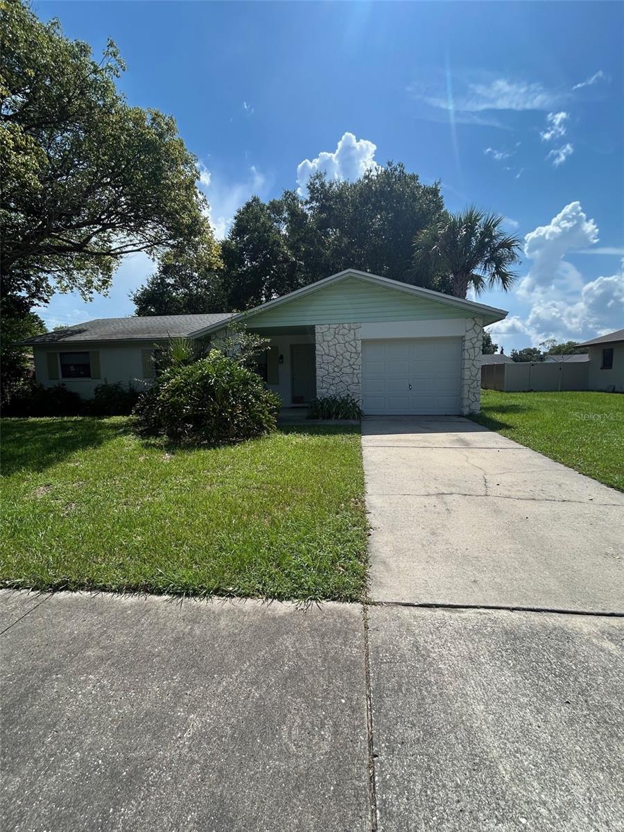 Bright and clean with lots of natural light. Sliding door leads to the lovely screened porch, perfect for entertaining. Recently updated flooring, bath fixtures, kitchen, and newer appliances. Washer and Dryer hookups in Garage. Great location near Lake Mary. This lovely home has it all and is ready for you!! A must see home.