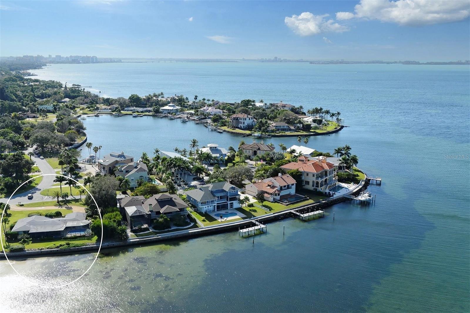 Experience unparalleled views of Sarasota Bay and a true sanctuary of native wildlife, from the resident dolphins and manatees to flocks of migrating birds and painted skies at sunset. Located in the highly desirable neighborhood of Sapphire Shores, considered the next West of Trail Hot Spot, this presents an excellent opportunity to own a prime Sarasota Bayfront property. Situated on 0.57 acres with 187 feet of waterfront, this property offers spectacular views of the bay and the Ca d’Zan, the historic former home of John and Mabel Ringling. Sadly, this 2 bedroom 2.5 bathroom midcentury gem sustained storm damage. Just a block from Sapphire Shores Park, a beloved neighborhood gathering place. The property is also centrally located minutes from the Ringling Museum of Art, and the Asolo Theater. Its proximity also offers easy access to downtown Sarasota for shopping, dining, and world-famous beaches. Seller has recently obtained a Survey and confirmed the ability to install dock and boat lift.
