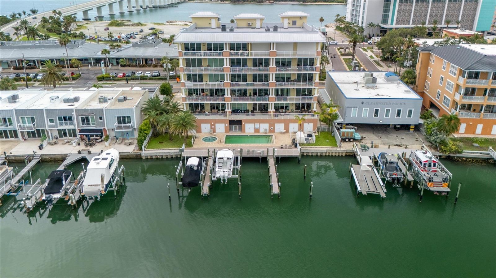 RARE OPPORTUNITY – 5TH FLOOR LUXURY WATERFRONT CONDO WITH PRIVATE BOAT SLIP, LIFT & CABANA!
This newer construction, fully furnished, turnkey 3-bedroom, 2-bath corner unit offers stunning water views throughout and is located in the highly sought-after Sandpipers Cove on exclusive Clearwater Beach. The sale includes one out of the four boat slips, no 4, the end slip in the complex with a 13,000 lb boat lift and private cabana no 6, making it a true boater’s dream!
Enjoy an expansive, oversized 30’ wide balcony, perfect for relaxing with morning coffee or watching dolphins and sunrises. Inside, the spacious open-concept floor plan features high ceilings, crown molding, and plenty of natural light—ideal for entertaining.
Upgrades include:
• Newly renovated guest bathroom
• Extended kitchen bar with granite countertops
• Glass-enclosed showers in both bathrooms
• Remote-controlled privacy shades in the living area and primary bedroom
• GE Café Series appliances
• Custom-built closets in all bedrooms and laundry
• Designer furnishings from Ethan Allen, Pottery Barn & Thomasville, styled in Classic, Coastal, and Modern themes
• Remote-controlled, adjustable base bed in the primary suite with two large closets
Community amenities include a heated waterfront pool & spa, gas grill, and peaceful, well-maintained surroundings. Just a short stroll to 2.5 miles of pristine quartz-sand beach, Pier 60, dining, shopping, and entertainment.
This is one of the few properties on Clearwater Beach offering 3-day minimum rentals, making it ideal as a primary residence, vacation getaway, or high-income investment property.
Don’t miss this rare opportunity to own on Clearwater Beach!