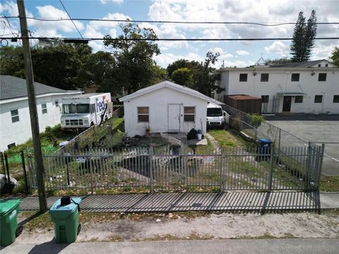 Photo of 1880 NW 65th Street, Miami, FL 33147 (MLS # TB8481143)