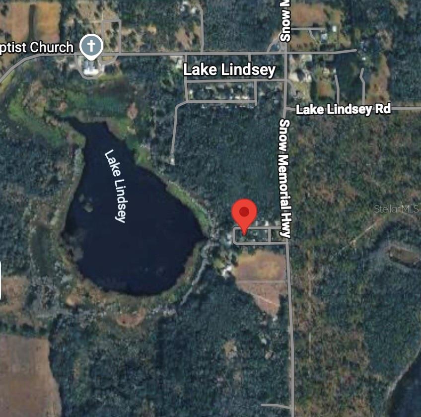 Photo of 22404 Lake Village Lane, Brooksville, FL 34601 (MLS # TB8558903)