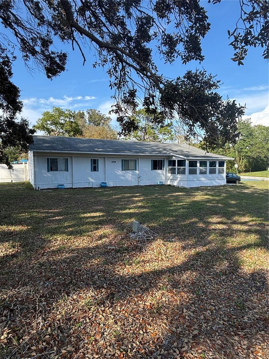 Discover endless possibilities with this unique 2-bedroom, 1-bathroom mobile home nestled on an oversized .30-acre lot in Spring Hill, FL. This property offers a blend of privacy and functionality, featuring a partially fenced yard—perfect for pets—and a large screened lanai to enjoy Florida's outdoor lifestyle. Inside, you'll find an oversized indoor laundry room and a flex space that can be customized to fit your needs. A standout feature is the detached concrete block 2-car garage, complete with ample storage and a built-in workbench—ideal for hobbyists or additional workspace. Major updates include a 2021 roof, 2019 HVAC, and updated electrical (2019), providing peace of mind. While the home does need new subflooring, flooring, and miscellaneous repairs, it offers a fantastic opportunity for customization. With .30 acres of land, the potential is endless—whether you're looking for space to expand, a place for recreational activities, or just a serene retreat. Don't miss out on this rare find! Schedule your showing today!