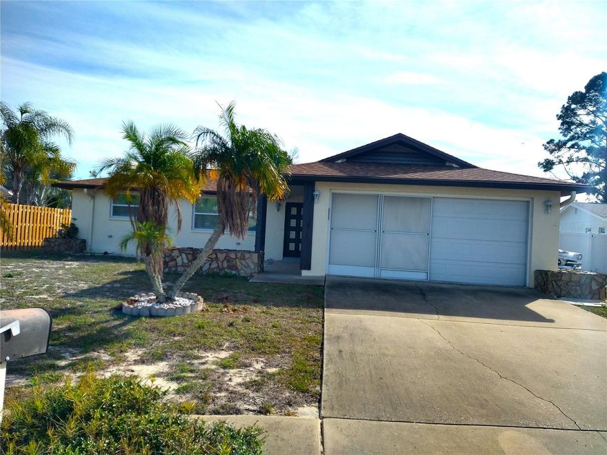 INVESTOR SPECIAL! This 2124 total sqft 2/2/2 pool home is nestled on a peaceful 0.23-acre lot on a cul-de-sac in a neighborhood of fine homes. Roof replaced 2022, Impact windows installed 2018. NO deed restrictions, NO HOA, NO CDD, NO flood zone. This home features an open floor plan, with a living room/kitchen/dinette/family room combination. Split bedrooms with a large walk-in closet in the master bedroom.   Sliders from family room and master bedroom open to the large, covered lanai and expansive pool area. Large backyard is mostly fenced and can easily become pet friendly. Close to many amenities including, medical services, hospitals, shopping and more. 40 minutes to Tampa International Airport, 2 hrs. to Orlando.