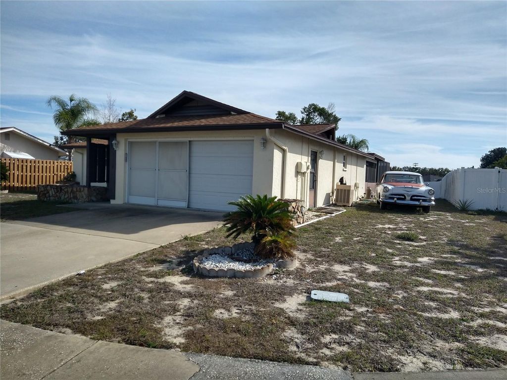 Photo of 8415 Briarleaf Court, Port Richey, FL 34668 (MLS # W7882036)