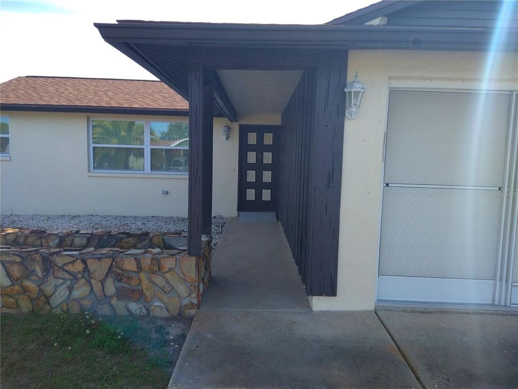 Photo of 8415 Briarleaf Court, Port Richey, FL 34668 (MLS # W7882036)