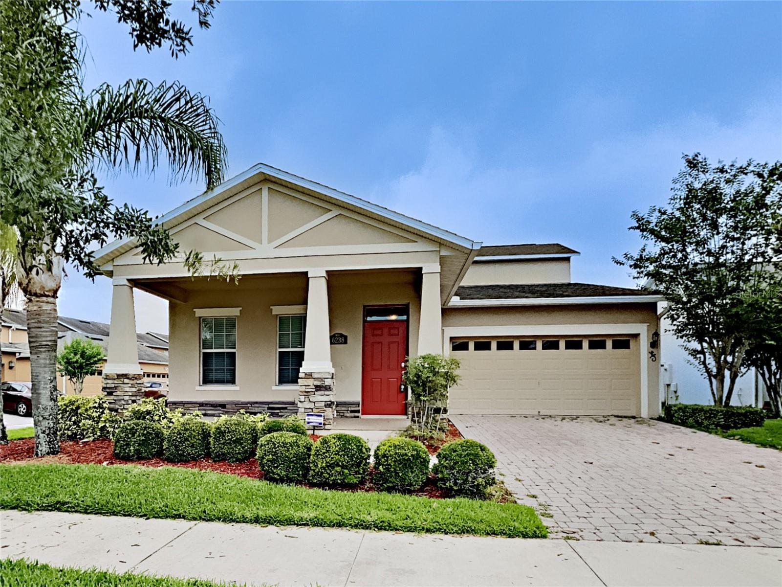 One or more photo(s) has been virtually staged. Welcome to home to this exceptional residence set on an oversized corner lot in the sought-after community of Signature Lakes in Winter Garden. Built in 2011 and impeccably maintained, this 4-bedroom, 3.5-bath home offers approximately 2,759 sq ft of thoughtfully designed living space. Its prime lot placement provides expanded outdoor living, enhanced privacy, and striking curb appeal from every angle. Inside, the open-concept layout creates a seamless flow between living and dining spaces, enhanced by tile and plush carpet flooring. The gourmet kitchen boasts granite countertops, rich wood cabinetry, stainless steel appliances, and a breakfast bar overlooking the spacious family room—perfect for both casual gatherings and formal entertaining. The main-level primary suite is a serene retreat, complete with a generous walk-in closet and a spa-inspired en-suite bath featuring dual vanities, a soaking garden tub, and a separate glass-enclosed shower. Upstairs, three additional bedrooms, two full baths, and a versatile loft area provide flexible space for a home office, media room, or play area. Step through sliding glass doors to a covered lanai and a fully fenced backyard offering endless possibilities for outdoor living. Whether envisioning a pool, an expanded patio, or simply more room to relax and play, this space is a true standout in the neighborhood. Residents of Signature Lakes enjoy resort-style amenities including two clubhouses, tennis and basketball courts, two swimming pools, dog parks, scenic walking and biking trails, and beautifully landscaped green spaces. This prime Winter Garden location offers quick access to SR-429 and is minutes from shopping, dining, and entertainment. This home is the perfect blend of style, comfort, and location and is ready to welcome its next owner.