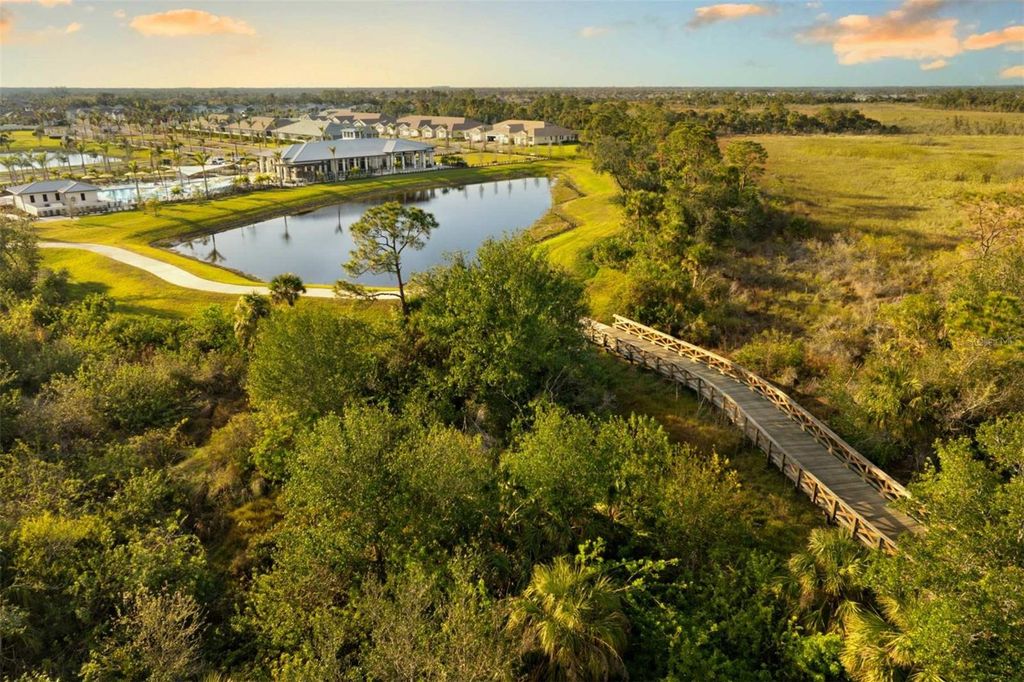 Photo of 12217 Meditation Trail, Venice, FL 34293 (MLS # TB8433554)