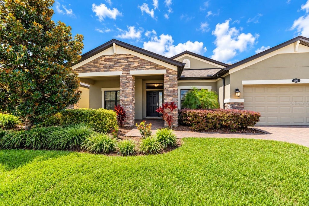 Photo of 1741 Cherry Walk Road, Lutz, FL 33558 (MLS # TB8517084)
