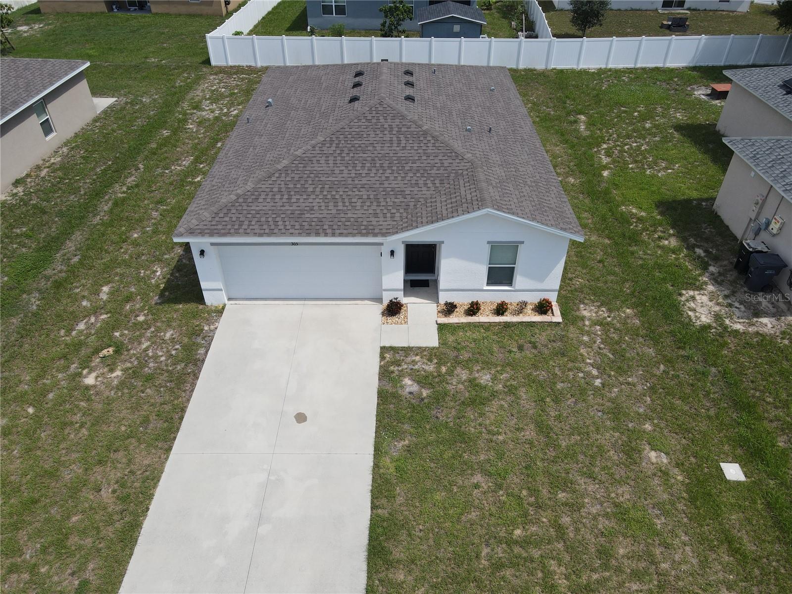 Check out this lightly-lived-in home with a lot to offer! Three bedrooms and two full baths. The kitchen has granite counters and backsplash plus a granite topped counter with sink and breakfast bar. The large living room has sliding glass doors out to the back yard, with 8x8 concrete slab, perfect for the BBQ. The primary bedroom has a walk-in closet plus private bath with dual sinks, and step-in tiled shower. The two secondary bedrooms share the second full bath. For continuity, both baths have the same gray granite countertops and backsplash as the kitchen counters. The flooring is luxury vinyl plank throughout, except for the bedrooms, which are carpeted. The inside laundry room leads out to the 2-car garage. The monthly HOA is very reasonable, and includes Spectrum cable and internet, a significant financial benefit! This is a well-priced home in excellent condition. Come see it today!