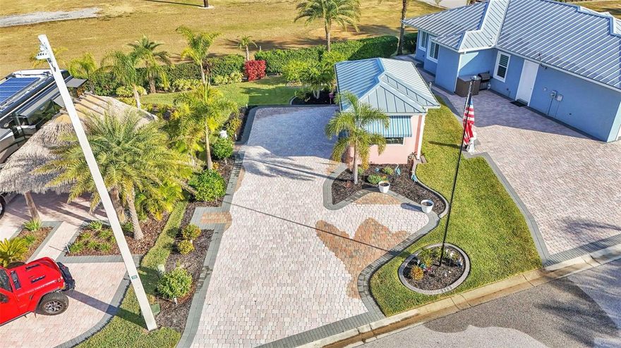 With mature landscaping, this paver pad and enclosed pavilion is ready to go and waiting for you to make it your personal paradise!

Positioned next to a very large corner lot and casita this property can be purchased by itself or with the 2 BR/2 Bath next door as a package deal. Check out the adjacent property: 3287 Red Tail Hawk Dr, Lot 105

Bay Lake Motorcoach Resort is a Class A motorcoach resort offering incredible amenities. Owners and visitors can fill their days with activities and club outings or simply relax and enjoy the resort. Whether in search of community, travel, relaxation or recreation, Bay Lake is your home base for the Florida Lifestyle.