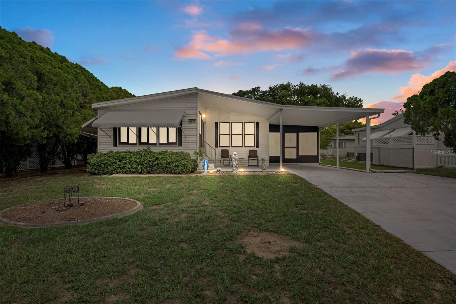2 Bed/2Bath Manufactured Home in Desired Brookridge Community!This charming home boasts 1156 Living SQFT and was built in 1988. The best part? You OWN YOUR OWN LAND! Features include a screened-in sunroom that connects to a utility room/workshop/hobby room, as well as another sunroom with real windows on the front connected to the living room. You'll find laminate wood and vinyl flooring throughout with newer flooring in the kitchen and bathroom. Enjoy an open floor plan in the common areas, a spacious master bedroom, and the convenience of the whole house being painted inside and out in the last three years. The kitchen was also refaced recently. More updates include a new roof in 2021 and a new AC in 2022!! Relax in the very private backyard thanks to thick shrubbery surrounding the property. Washer and dryer are included, and the home can be left furnished for your convenience. Don't miss out on this opportunity to own a piece of paradise in the Brookridge Community. Schedule a showing today!