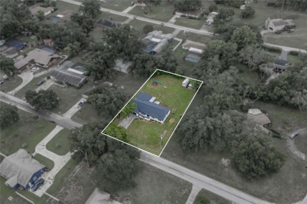 Photo of 37320 Moore Drive, Dade City, FL 33525 (MLS # TB8523888)