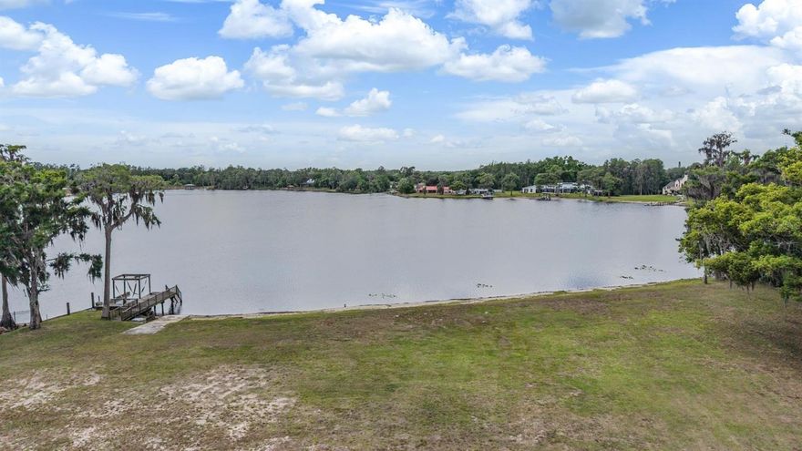 Explore the unique potential of this sizable property at 215 Lake Brant Dr. Located in a quiet, scenic neighborhood, this oversized parcel offers more than 4 acres of land along with 295 feet of lake frontage, creating an ideal setting to build a custom home or pursue a development opportunity. Whether planning a single residence or considering a split into two homesites, the property offers flexibility to suit a variety of visions. Positioned on ski-sized Lake Brant, spanning over 60 acres, the site captures direct sunset views across the water. The location provides convenient access to highly rated schools, restaurants, retail, and is just minutes from Avila Golf and Country Club, with easy connectivity to major roadways for commuting into Tampa. Surrounded by mature landscaping and set within an established community, this property presents a rare opportunity to create something special at 215 Lake Brant Dr.