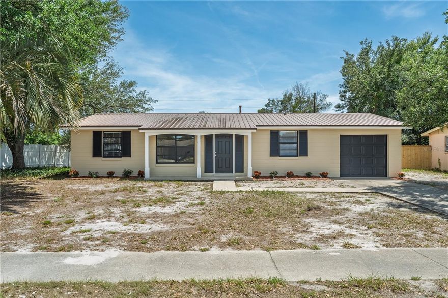 Beautifully renovated from top to bottom, this move-in ready 3-bedroom, 2-bathroom home in the heart of Deltona offers the perfect blend of style, comfort, and convenience. Ideally located just minutes from major roads, schools, Publix, Lowe’s, shopping, and dining, this property makes everyday living easy while still providing a quiet residential feel.
Inside, you’ll immediately notice the fresh modern updates throughout, including new interior paint, durable wood-look vinyl flooring, updated lighting, and a bright open layout designed for comfortable living. The stunning new kitchen features timeless shaker cabinetry, sleek countertops, and brand-new stainless steel appliances, creating a clean and functional space perfect for cooking and entertaining.
Just off the kitchen, a highly functional mudroom and utility space leads directly to the garage, offering extra storage, organization, and everyday convenience. The garage also includes a dedicated washer and dryer hookup area along with direct access to the backyard.
Both bathrooms have been beautifully redesigned with stylish new tile, updated vanities, modern lighting, and tubs for relaxation and functionality. The expansive primary suite offers a peaceful retreat complete with a large walk-in closet. All three bedrooms are thoughtfully spaced for privacy, including a rear bedroom with its own private exterior access—ideal for guests, a home office, or multigenerational living.
Outside, the home continues to impress with fresh exterior paint, updated landscaping, fencing on three sides, and a durable metal roof built for long-term peace of mind.
This fully updated home is ready for its next owner to move right in and enjoy.