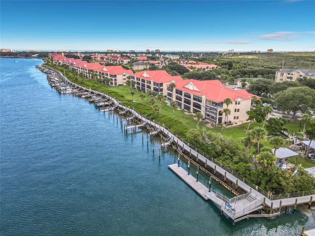 Photo of 404 Bouchelle Drive #203, New Smyrna Beach, FL 32169 (MLS # O6432494)
