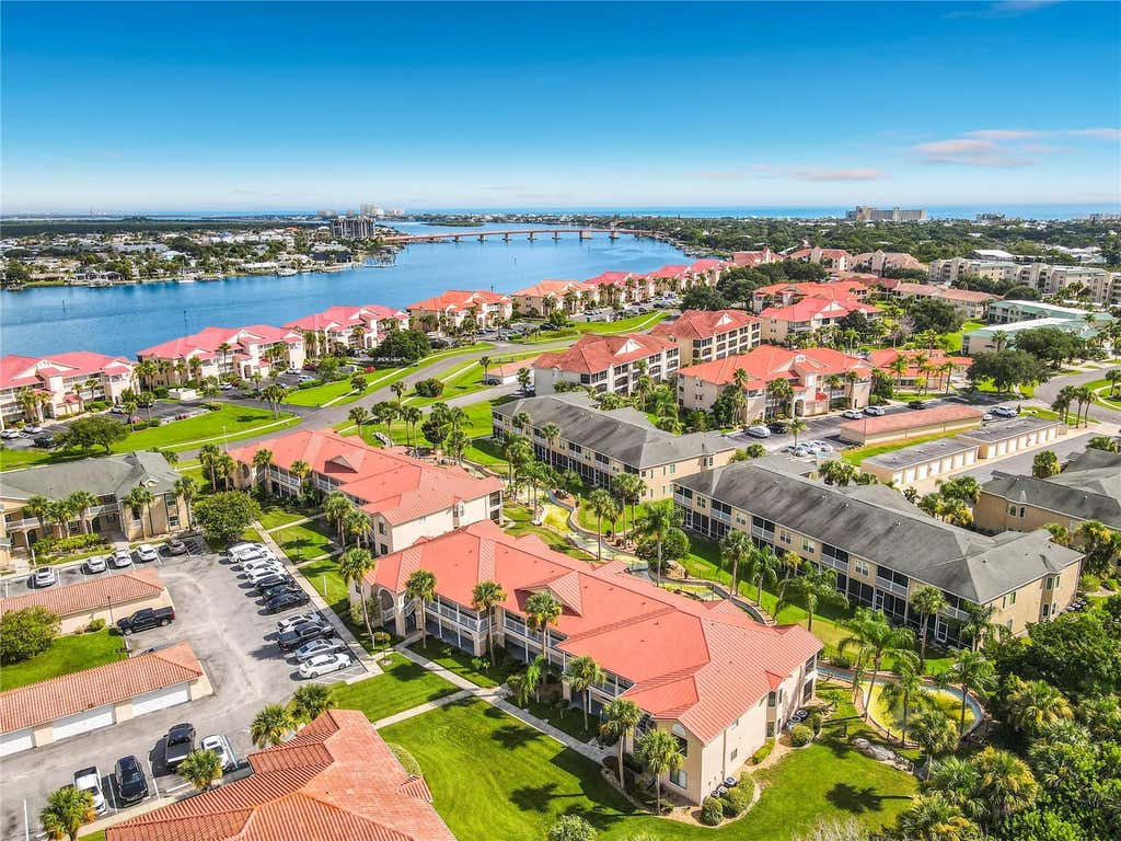 Photo of 404 Bouchelle Drive #203, New Smyrna Beach, FL 32169 (MLS # O6432494)