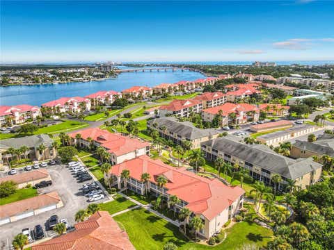 Photo of 404 Bouchelle Drive #203, New Smyrna Beach, FL 32169 (MLS # O6432494)