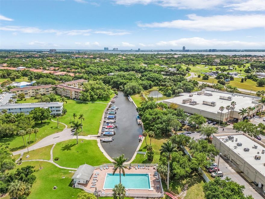 Welcome to your new home at the vibrant 55+ Tropic Terrace Condo Community! This charming and updated FIRST FLOOR condo is ready for you to move in and start enjoying the Florida lifestyle. As you step inside, you'll notice the inviting ambiance with tile flooring throughout, creating a seamless and easy-to-maintain living space. The kitchen and bathroom have been recently updated, offering modern convenience and style. You'll find your assigned parking spot right outside your front door. Key upgrades include a new electric panel, high hats for ample lighting, and new Hunter fans with remotes for added comfort and energy efficiency. The entire condo has been freshly painted, giving it a clean and welcoming feel. One of the unique features of this community is the availability of dock leases on a first-come, first-served basis on a gulf access canal, along with a convenient boat launch. Residents can also enjoy community amenities such as a beautiful pool area, perfect for socializing and relaxing under the sun. If you're feeling active, there's even a shuffleboard area where you can challenge your new friends to a friendly game. Conveniently located, this condo offers easy access to both downtown Fort Myers and Cape Coral, ensuring you're never far from shopping, dining, entertainment, and all the attractions Southwest Florida has available. Don't miss out on this opportunity to own a piece of paradise in a thriving 55+ community. Schedule a showing today and make this adorable condo your new home!