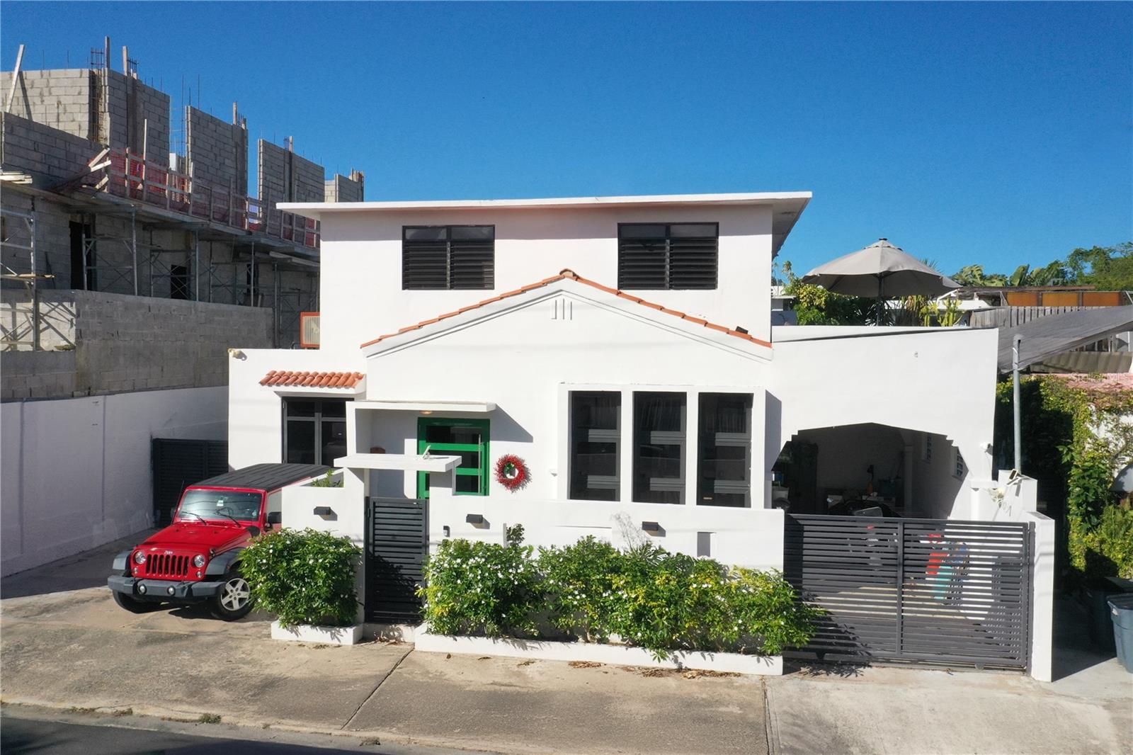 Introducing a spacious multi-family home at España 2007, Ocean Park, Puerto Rico. This substantial 5010 square foot property offers 9 sizable bedrooms and is perfectly situated just steps away from the beach. Nestled within a friendly and popular beach community, residents can easily indulge in the tranquility of coastal living while harnessing the property's potential as a rental and investment asset.
This distinctive dwelling is thoughtfully segmented into four separate units. The main house features four comfortable bedrooms, with two additional units offering two bedrooms each, and a final unit with one bedroom. Each unit is designed to foster a sense of community while maintaining privacy. The property is currently generating income, making it an excellent opportunity for those seeking a profitable investment.
The property includes standout features such as a well-maintained pool, providing a refreshing respite from the warm Puerto Rican sun, and a terrace that serves as a pleasant space for relaxation or casual gatherings. Its proximity to the beach and its ongoing income potential make it a fantastic opportunity to acquire a sizeable property in a sought-after beach community.