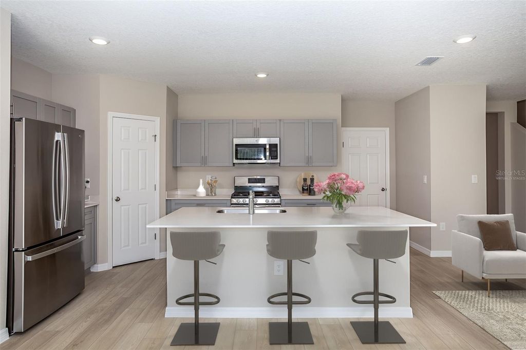 Photo of 4612 River Beacon Boulevard, Davenport, FL 33837 (MLS # TB8491248)