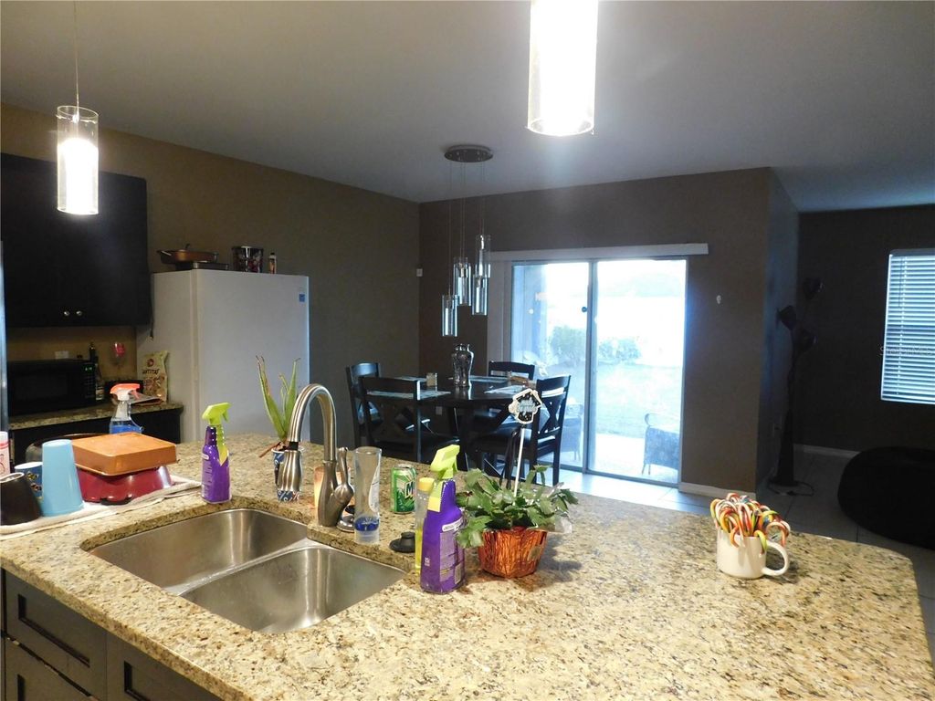 Photo of 425 Montego Bay Drive, Mulberry, FL 33860 (MLS # TB8465829)