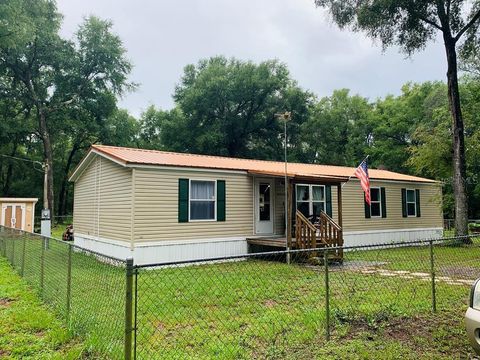 Photo of 4969 NW 32nd Place, Bell, FL 32619 (MLS # GC535846)
