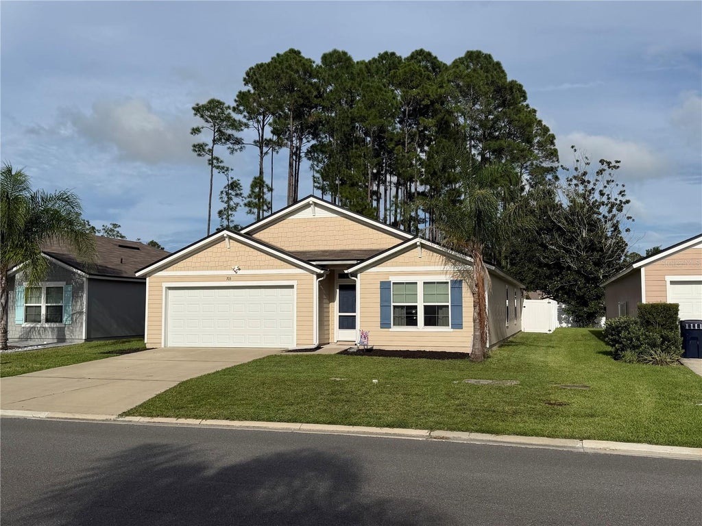Photo of 703 Grand Reserve Drive, Bunnell, FL 32110 (MLS # O6437750)