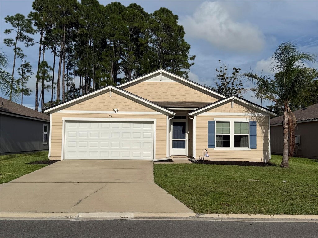 Photo of 703 Grand Reserve Drive, Bunnell, FL 32110 (MLS # O6437750)