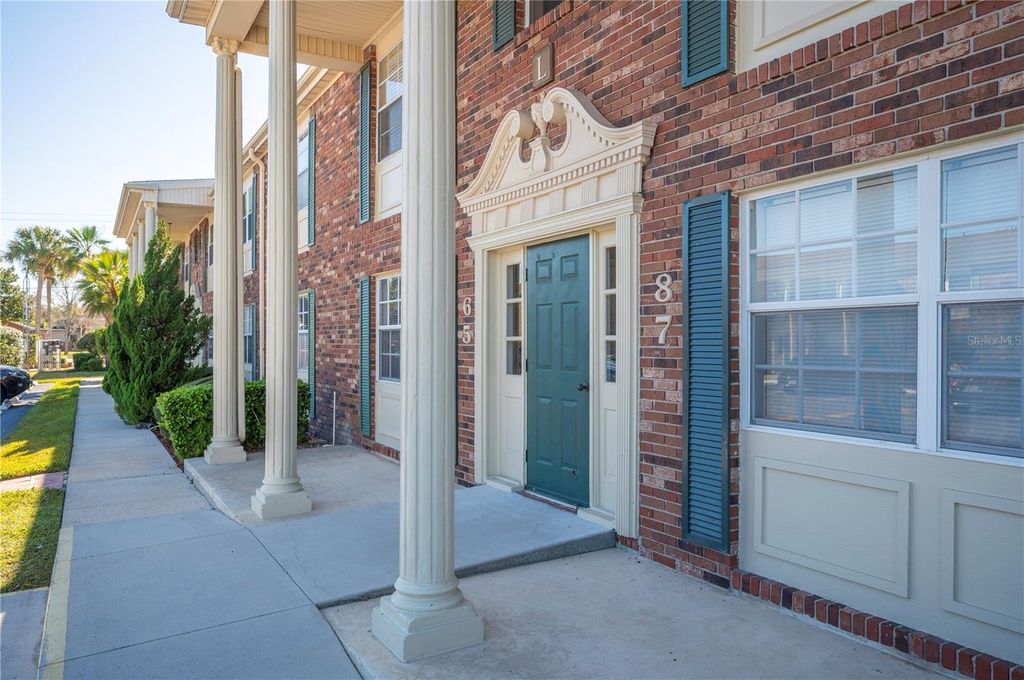 Photo of 1920 E Edgewood Drive #L5, Lakeland, FL 33803 (MLS # L4958885)